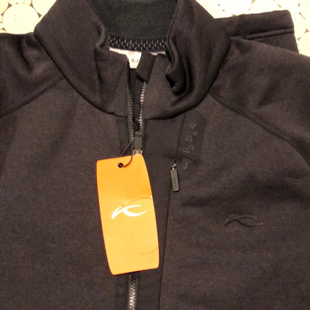 New with tags Mens KJUS 1/2 Zip  Sz Medium. The Midlayer Half Zip Black